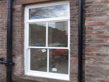 Doctor and Mrs T. Formby, Installtion of Red Grandis Timber Box sash windows. Astragal Bar. Sash hors to match existing windows, Kripton double glazed units . 3mm glass / 4mm spacer/ 4mm glass Low E. Full wieghted sytem 